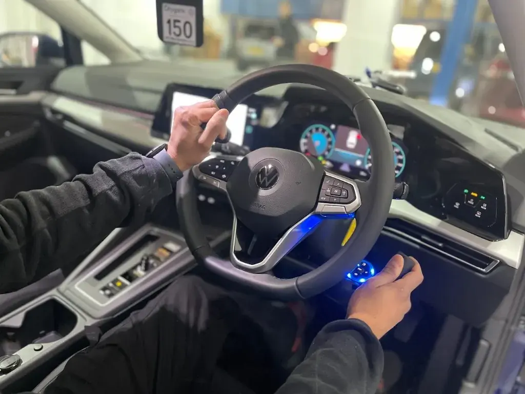 Hand controls inside a vehicle